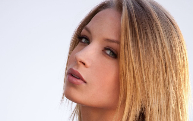 Blonde woman serious portrait naturalism free wallpaper for desktop - medium preview image