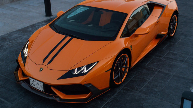Orange sports car black stripe free wallpaper for desktop - medium preview image