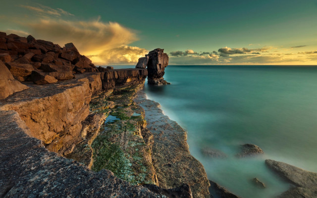 Sunset ocean rocks cliff water free wallpaper for desktop - medium preview image