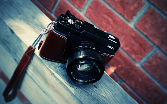 Camera brick wall leather case free wallpaper for desktop - medium preview image