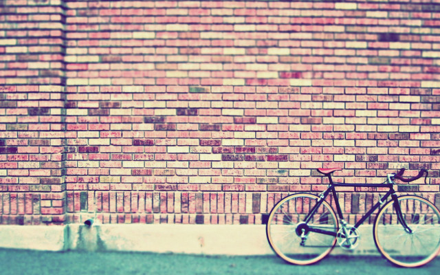 Bike parked brick wall street free wallpaper for desktop - medium preview image