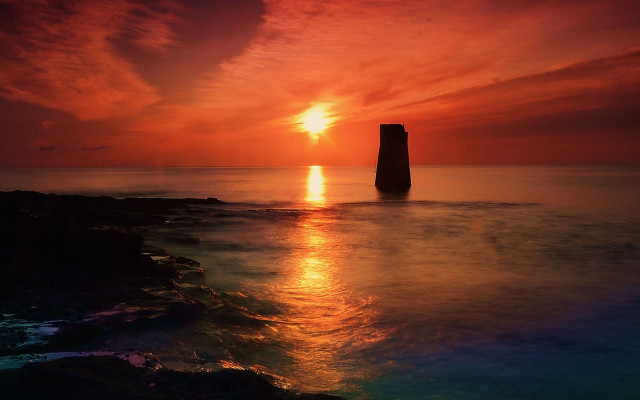 Sunset ocean rock mountain mystical free wallpaper for desktop - medium preview image