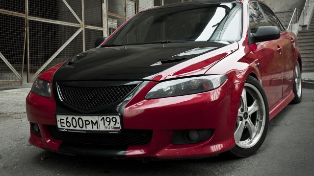 Red car street building sign free wallpaper for desktop - medium preview image