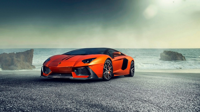 Orange sports car ocean dark free wallpaper for desktop - medium preview image