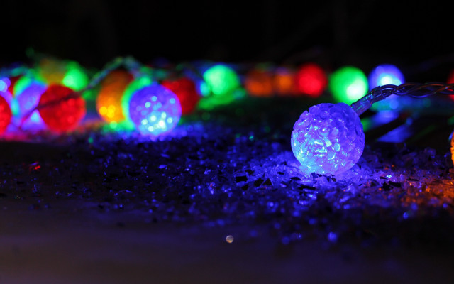 Glowing lights chain macro colorful free wallpaper for desktop - medium preview image
