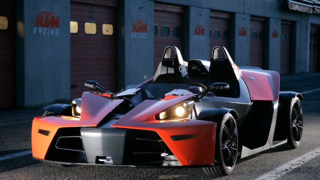 Car lighted parked building garage free wallpaper for desktop - medium preview image