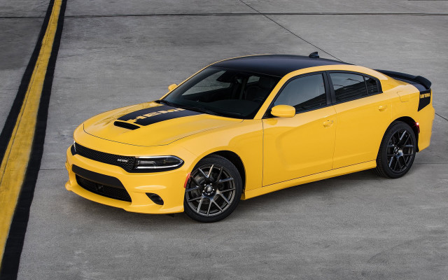 Yellow dodge charger concrete lot free wallpaper for desktop - medium preview image
