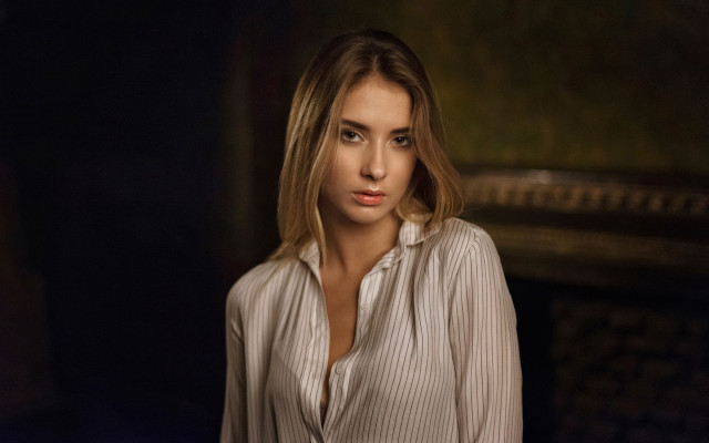 Blonde woman pinstripe shirt fireplace free wallpaper for desktop - medium preview image