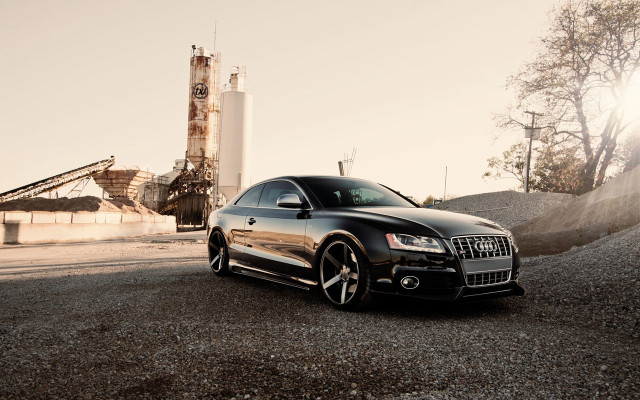 Black car factory machinery tiltshift free wallpaper for desktop - medium preview image