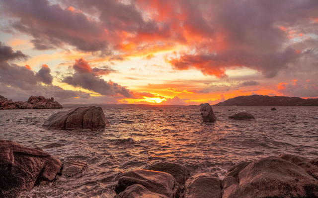 Sunset ocean rocks mountains cloudy free wallpaper for desktop - medium preview image