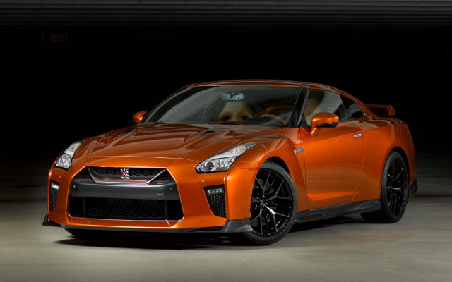 Orange sports car dog garage free wallpaper for desktop - medium preview image