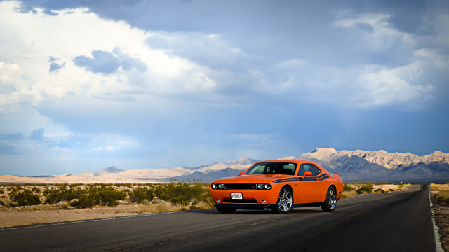 Orange car desert mountains tilt free wallpaper for desktop - medium preview image