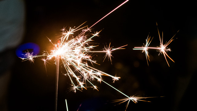 Sparkler night city lights fireworks free wallpaper for desktop - medium preview image