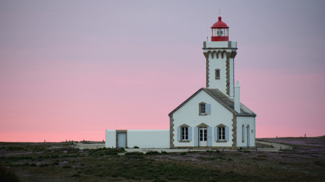 Lighthouse sunset pink sky hill free wallpaper for desktop - medium preview image