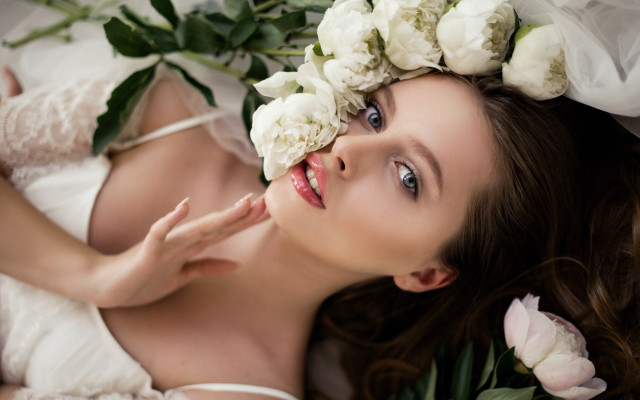 Wedding dress laying flowers portrait free wallpaper for desktop - medium preview image