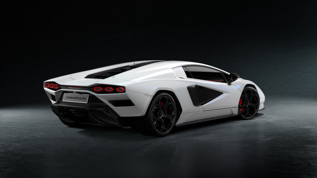 White sports car dark room #4 free wallpaper for desktop - medium preview image