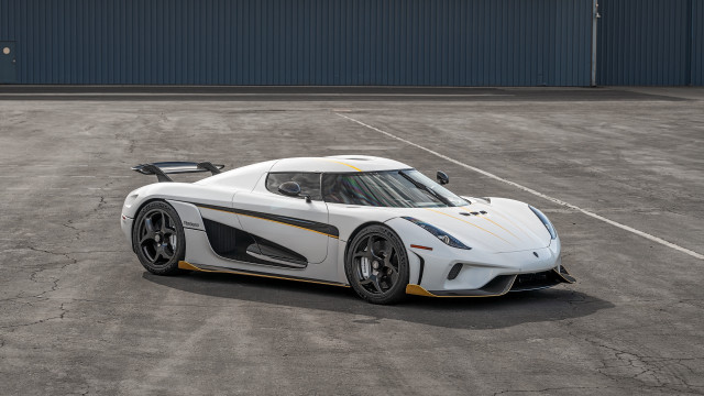 White sports car parking lot #2 free wallpaper for desktop - medium preview image