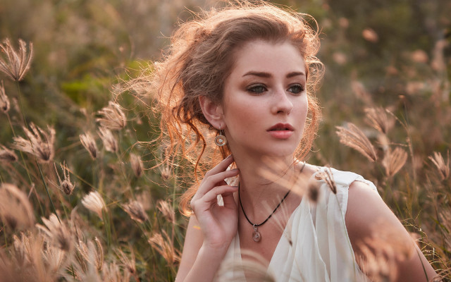Woman field blowing hair jewelry free wallpaper for desktop - medium preview image