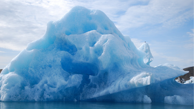 Iceberg ocean shore sky mountain free wallpaper for desktop - medium preview image