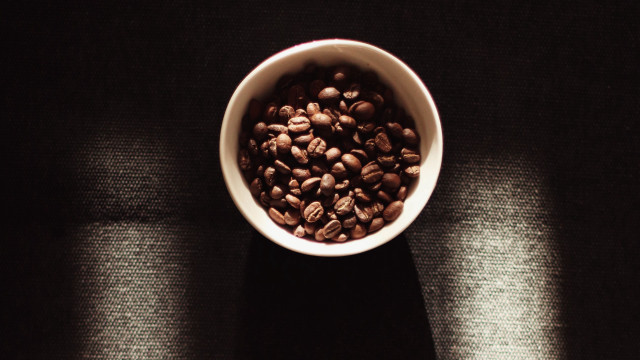 Coffee beans black surface shadows free wallpaper for desktop - medium preview image