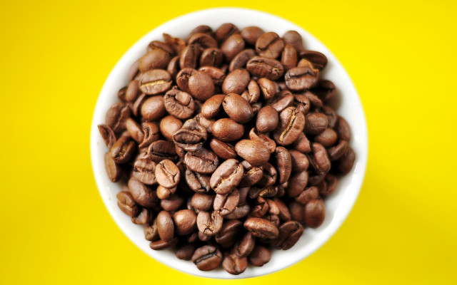 Coffee beans yellow background hyperrealism free wallpaper for desktop - medium preview image