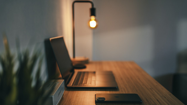 Laptop wooden desk plant phone #2 free wallpaper for desktop - medium preview image