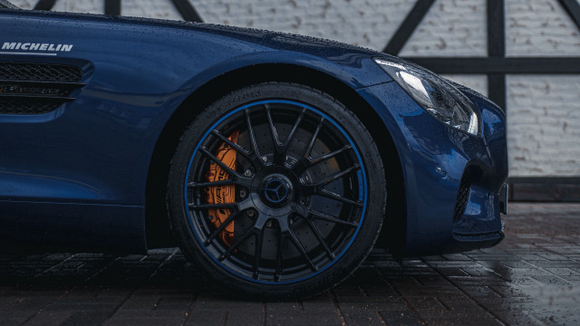 Blue sports car brick wall #2 free wallpaper for desktop - medium preview image
