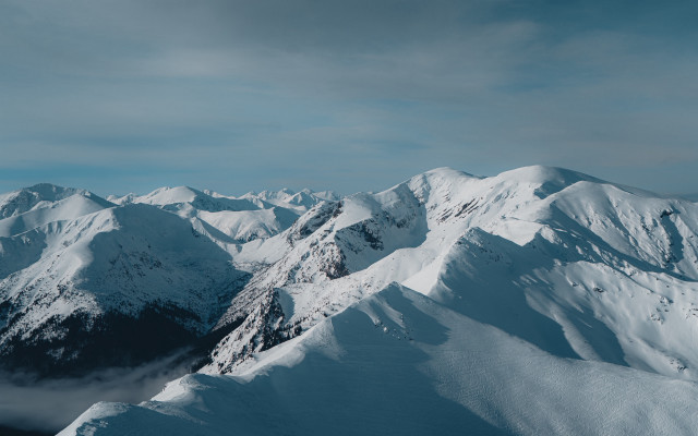 Mountain range snowy cloudy day free wallpaper for desktop - medium preview image