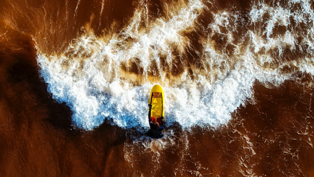 Surfboard wave ocean person night free wallpaper for desktop - medium preview image