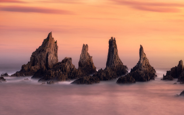 Rock water pink sky sunset free wallpaper for desktop - medium preview image