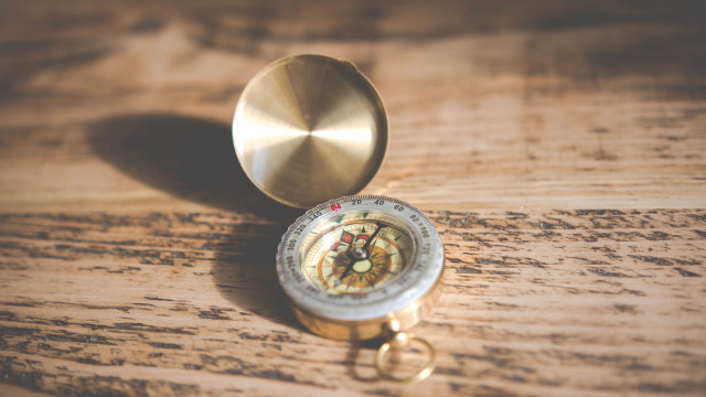 Compass wooden table metal keychain free wallpaper for desktop - medium preview image