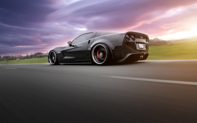 Black sports car sunset dramatic free wallpaper for desktop - medium preview image