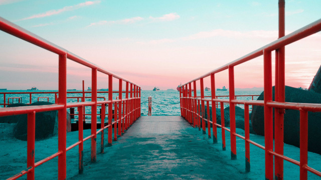 Red metal walkway ocean sunset free wallpaper for desktop - medium preview image