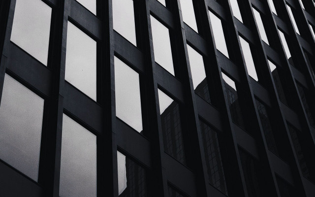 Tall building clock bauhaus brutalism free wallpaper for desktop - medium preview image