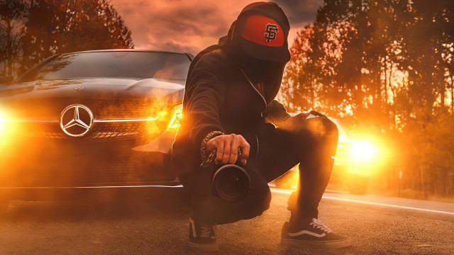 Hoodie man crouching car autumn free wallpaper for desktop - medium preview image