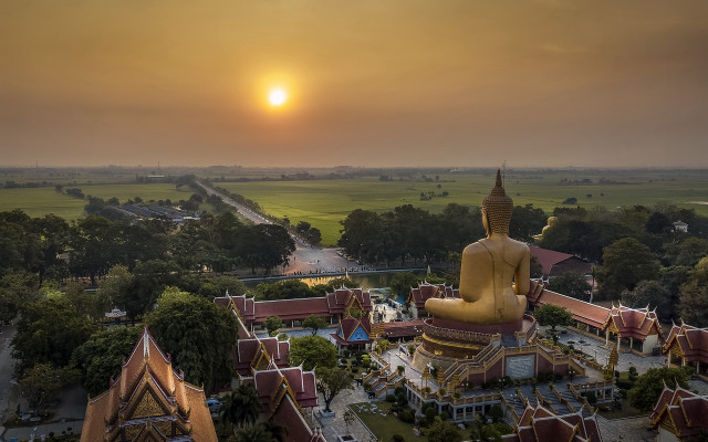 Buddha statue lush field forest free wallpaper for desktop - medium preview image