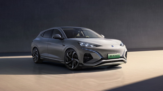 Silver electric car parking lot free wallpaper for desktop - medium preview image