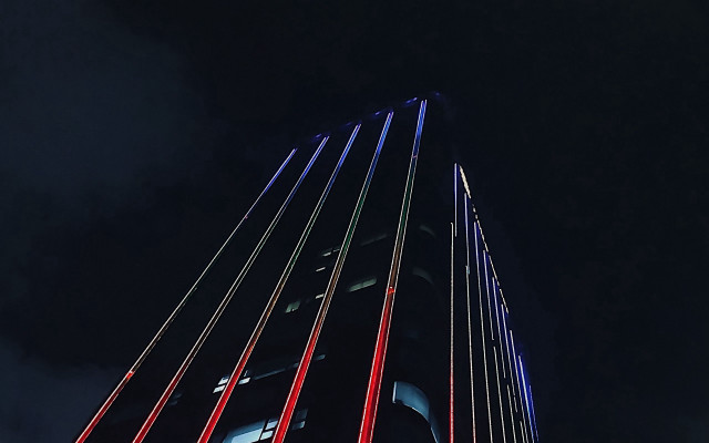 Tall building sky background neon free wallpaper for desktop - medium preview image