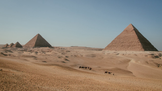 Desert camel riders pyramids blue free wallpaper for desktop - medium preview image