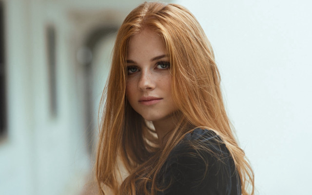 Woman redhair serious portrait blurry free wallpaper for desktop - medium preview image