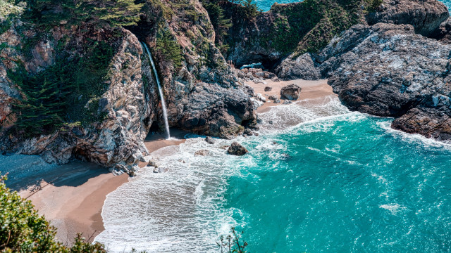 Waterfall ocean beach cliff sand free wallpaper for desktop - medium preview image