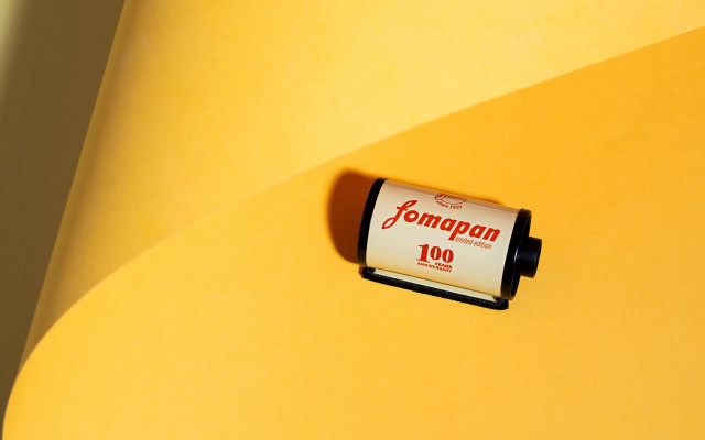 Battery yellow surface white background free wallpaper for desktop - medium preview image