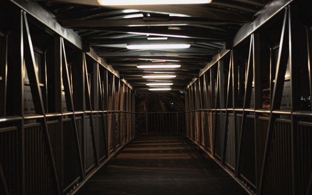 Long hallway metal fence clock free wallpaper for desktop - medium preview image