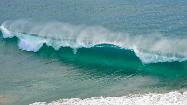 Large wave ocean shore surfer free wallpaper for desktop - medium preview image