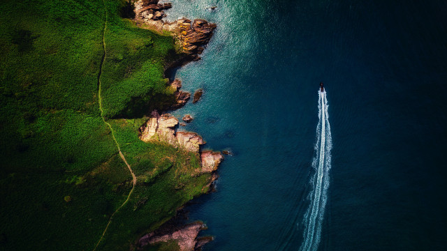 Boat rocky shore night starry free wallpaper for desktop - medium preview image