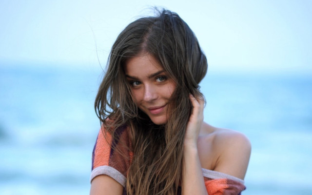 Woman beach longhair looking at free wallpaper for desktop - medium preview image