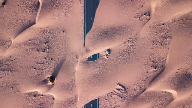 Snowy road footprints car land free wallpaper for desktop - medium preview image