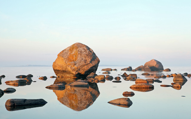 Large rock lake surrounding rocks free wallpaper for desktop - medium preview image