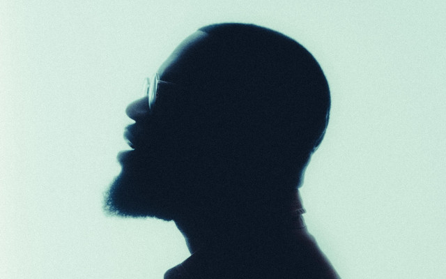 Bearded man glasses dark room free wallpaper for desktop - medium preview image