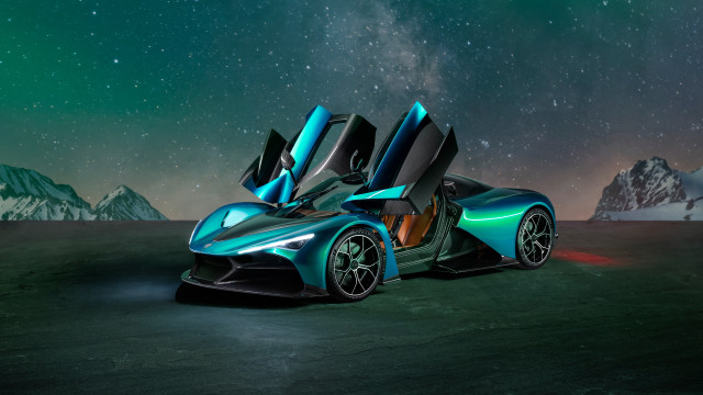 Futuristic car desert mountains starry free wallpaper for desktop - medium preview image